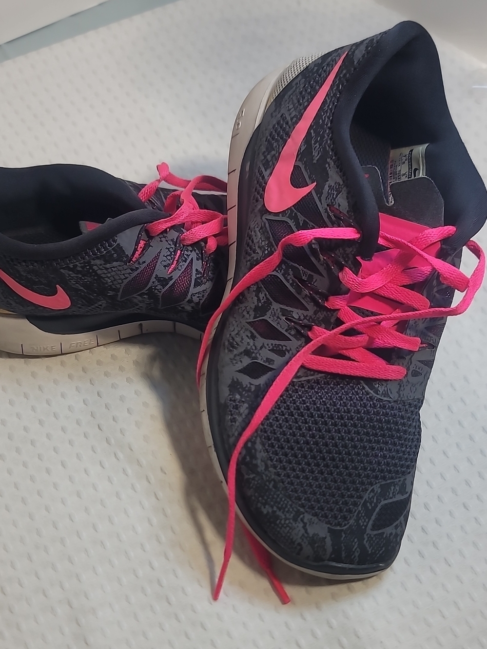 Nike Women's Black Athletic Shoes with Pink Accents